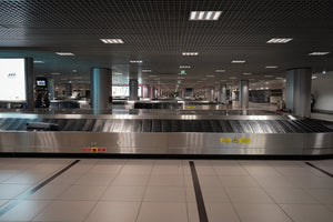 Families with children at Lisbon Airport, highlighting the family-friendly services available to make traveling with kids easier.